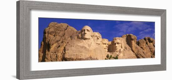 This Is a Close Up View of Mount Rushmore National Monument Against a Blue Sky-null-Framed Photographic Print