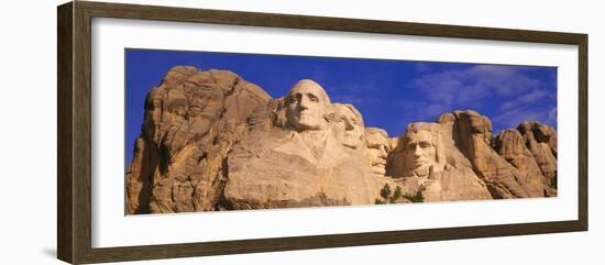 This Is a Close Up View of Mount Rushmore National Monument Against a Blue Sky-null-Framed Photographic Print