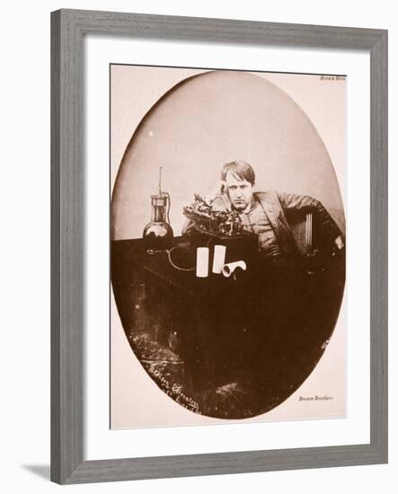 Thomas A. Edison Sitting by His Improved Machine, 1889-null-Framed Photographic Print