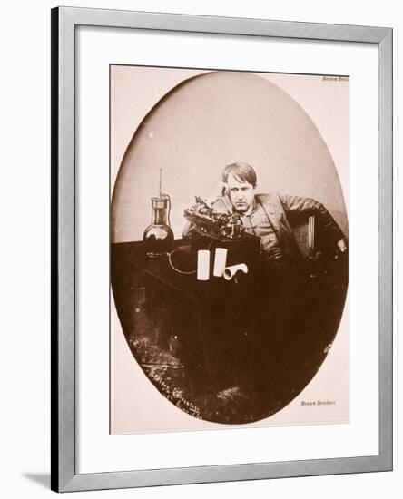 Thomas A. Edison Sitting by His Improved Machine, 1889-null-Framed Photographic Print