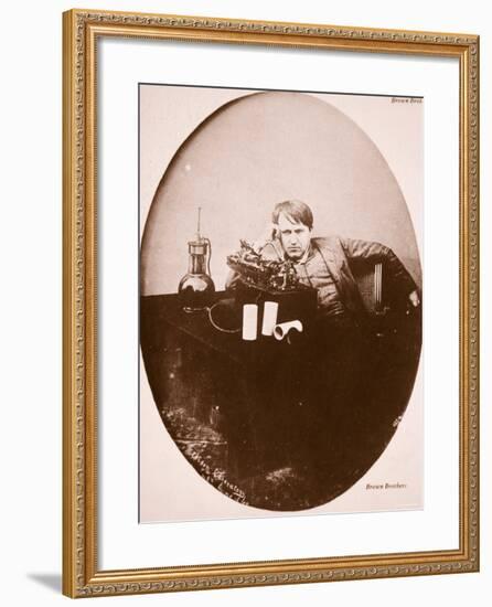 Thomas A. Edison Sitting by His Improved Machine, 1889-null-Framed Photographic Print