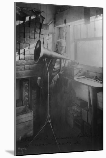 Thomas Edison Listening To The Phonograph-null-Mounted Art Print