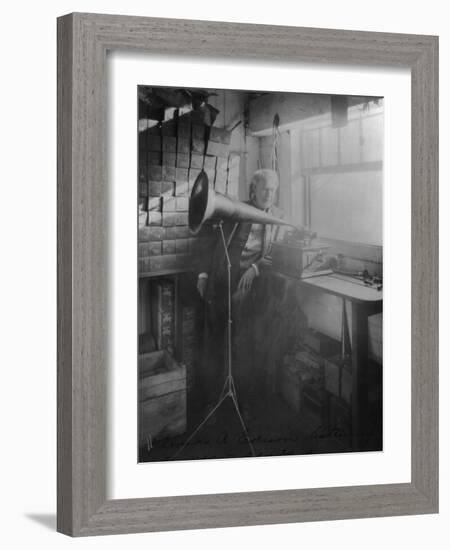 Thomas Edison Listening To The Phonograph-null-Framed Art Print