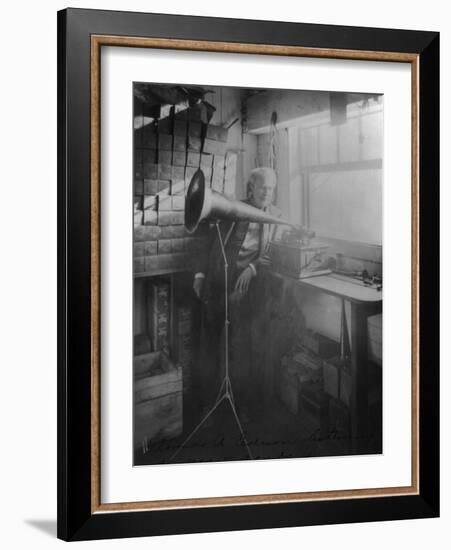 Thomas Edison Listening To The Phonograph-null-Framed Art Print