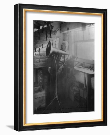 Thomas Edison Listening To The Phonograph-null-Framed Art Print