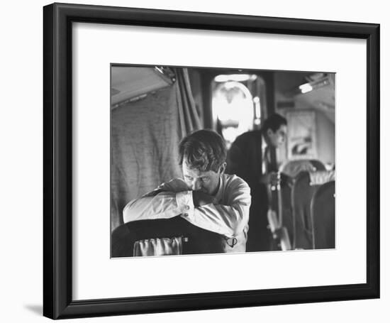 Thoughtful Senator Robert F. Kennedy on Airplane During Campaign Trip to Aid Local Candidates-Bill Eppridge-Framed Photographic Print