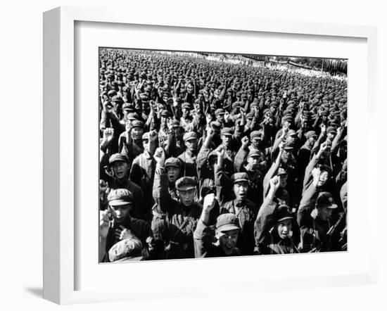 Thousands of Red Army Soldiers Raise their Clenched Fists-null-Framed Photo