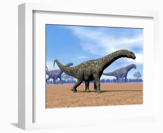 Three Argentinosaurus Dinosaurs Walking in the Desert-null-Framed Premium Giclee Print