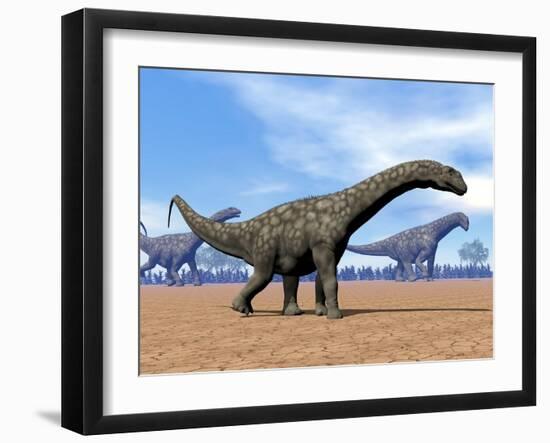 Three Argentinosaurus Dinosaurs Walking in the Desert-null-Framed Art Print