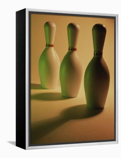 Three Bowling Pins in a Line-null-Framed Premier Image Canvas