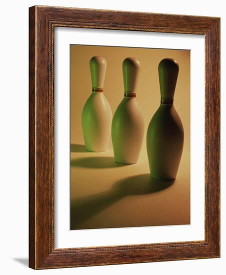 Three Bowling Pins in a Line-null-Framed Photographic Print