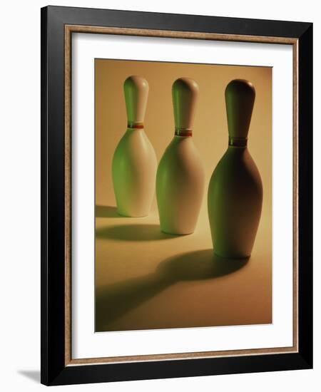 Three Bowling Pins in a Line-null-Framed Photographic Print