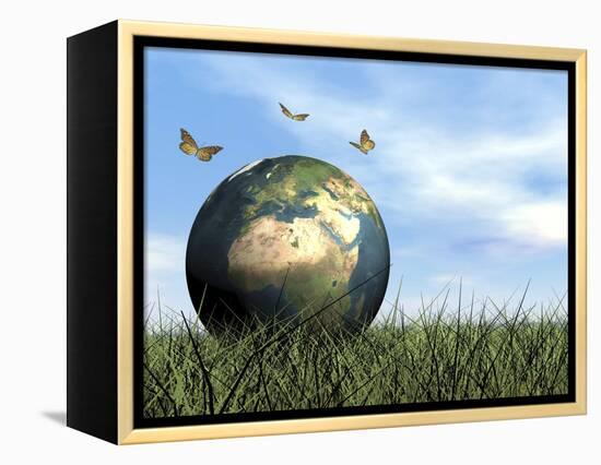 Three Butterflies Flying around Earth Globe-null-Framed Stretched Canvas