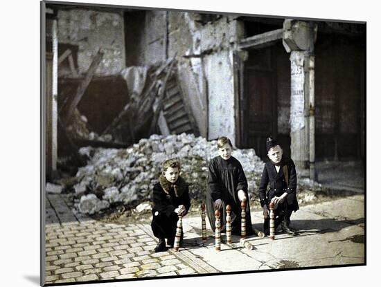 Three Children Playing with Bowling Pins at the Place Drouet d'Erlon, Reims, Marne, France, 1917-Fernand Cuville-Mounted Giclee Print