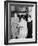 Three Children Standing Together Playing a Game-null-Framed Photo