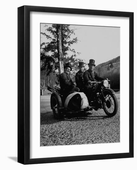 Three Chimney Sweeps Riding a Motorcycle-Dmitri Kessel-Framed Photographic Print