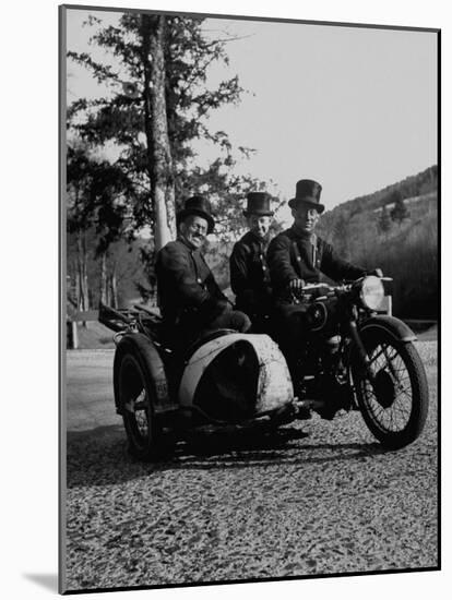 Three Chimney Sweeps Riding a Motorcycle-Dmitri Kessel-Mounted Photographic Print