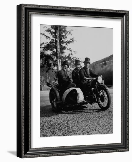 Three Chimney Sweeps Riding a Motorcycle-Dmitri Kessel-Framed Photographic Print