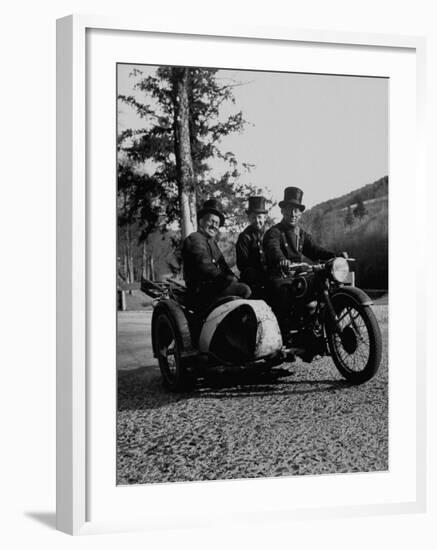 Three Chimney Sweeps Riding a Motorcycle-Dmitri Kessel-Framed Photographic Print