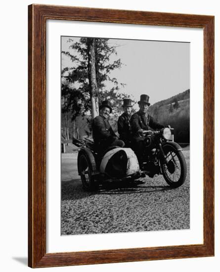 Three Chimney Sweeps Riding a Motorcycle-Dmitri Kessel-Framed Photographic Print