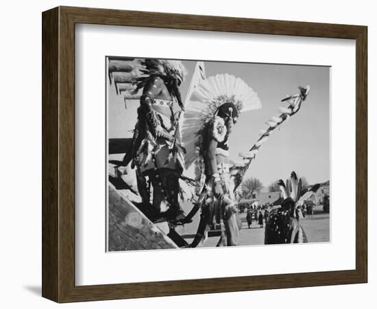 Three Indians In Headdress Watching Tourists "Dance San Ildefonso Pueblo New Mexico 1942." 1942-Ansel Adams-Framed Art Print