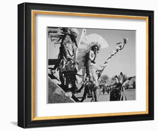 Three Indians In Headdress Watching Tourists "Dance San Ildefonso Pueblo New Mexico 1942." 1942-Ansel Adams-Framed Art Print