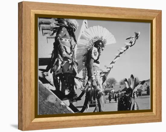 Three Indians In Headdress Watching Tourists "Dance San Ildefonso Pueblo New Mexico 1942." 1942-Ansel Adams-Framed Stretched Canvas