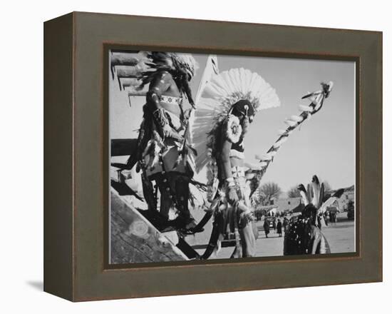 Three Indians In Headdress Watching Tourists "Dance San Ildefonso Pueblo New Mexico 1942." 1942-Ansel Adams-Framed Stretched Canvas