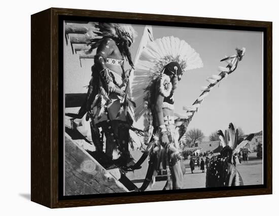 Three Indians In Headdress Watching Tourists "Dance San Ildefonso Pueblo New Mexico 1942." 1942-Ansel Adams-Framed Stretched Canvas