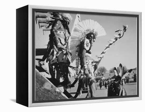 Three Indians In Headdress Watching Tourists "Dance San Ildefonso Pueblo New Mexico 1942." 1942-Ansel Adams-Framed Stretched Canvas