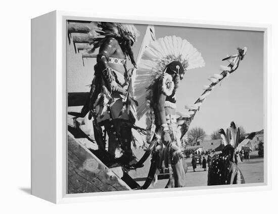 Three Indians In Headdress Watching Tourists "Dance San Ildefonso Pueblo New Mexico 1942." 1942-Ansel Adams-Framed Stretched Canvas