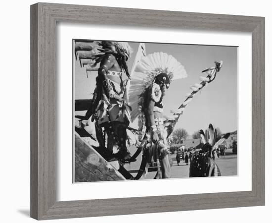 Three Indians In Headdress Watching Tourists "Dance San Ildefonso Pueblo New Mexico 1942." 1942-Ansel Adams-Framed Art Print