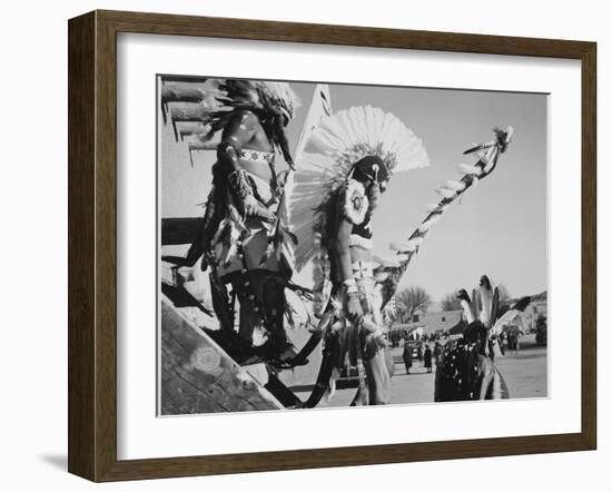 Three Indians In Headdress Watching Tourists "Dance San Ildefonso Pueblo New Mexico 1942." 1942-Ansel Adams-Framed Art Print