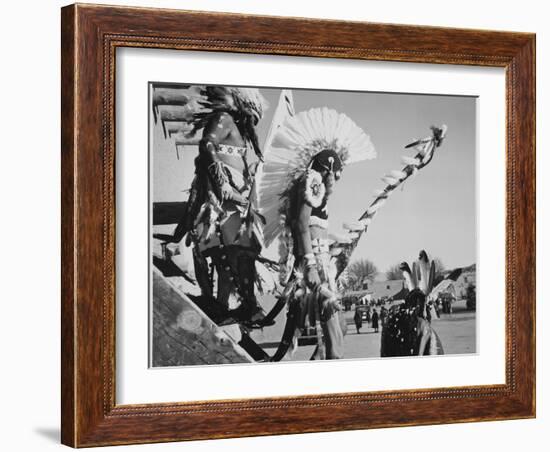 Three Indians In Headdress Watching Tourists "Dance San Ildefonso Pueblo New Mexico 1942." 1942-Ansel Adams-Framed Art Print