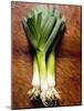 Three Leeks on Wooden Background-null-Mounted Photographic Print