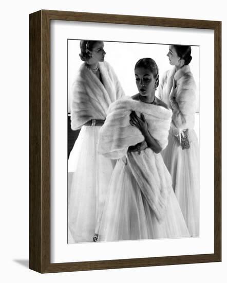 Three Models Wearing White Mink Stoles over Long Evening Dresses-Gjon Mili-Framed Photographic Print