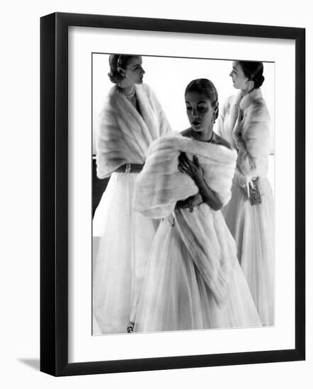 Three Models Wearing White Mink Stoles over Long Evening Dresses-Gjon Mili-Framed Photographic Print