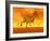 Three Monolophosaurus Dinosaurs in the Desert by Sunset-null-Framed Art Print