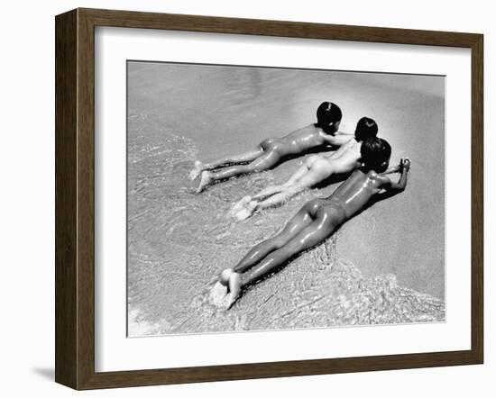 Three Native Boys Sunbathing Nude at the Edge of the Surf at Ocean Beach-Howard Sochurek-Framed Photographic Print