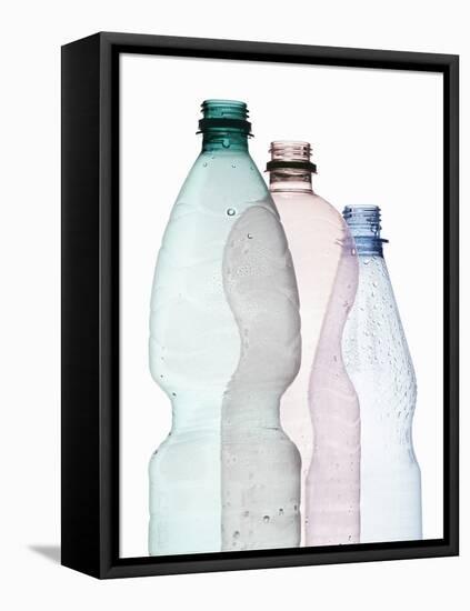 Three Plastic Bottles-Petr Gross-Framed Premier Image Canvas