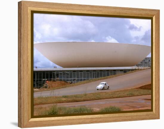 Three Powers Square Building Built by Oscar Niemeyer as Volkwagan drives by-Dmitri Kessel-Framed Premier Image Canvas