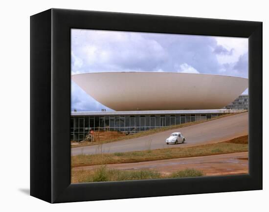 Three Powers Square Building Built by Oscar Niemeyer as Volkwagan drives by-Dmitri Kessel-Framed Premier Image Canvas