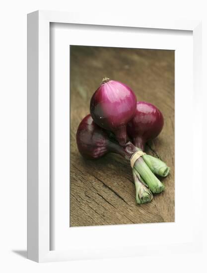 Three Red Onions on Wooden Background-Vladimir Shulevsky-Framed Photographic Print