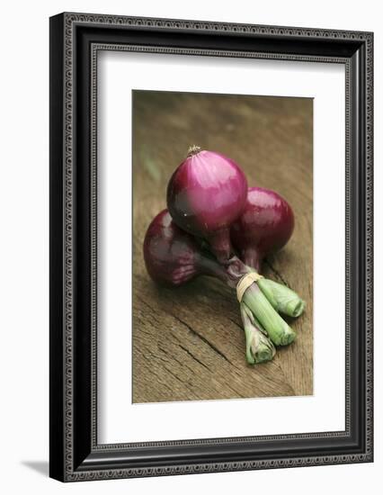 Three Red Onions on Wooden Background-Vladimir Shulevsky-Framed Photographic Print