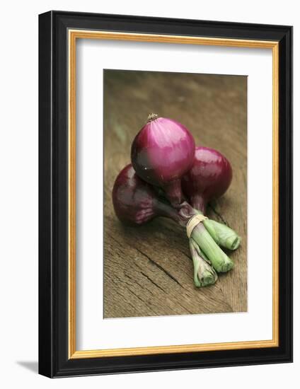 Three Red Onions on Wooden Background-Vladimir Shulevsky-Framed Photographic Print