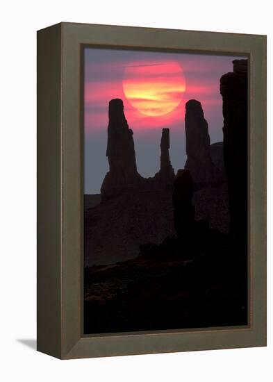 Three Sisters formation silhouetted at sunset, Monument Valley, Arizona-Adam Jones-Framed Premier Image Canvas