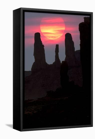 Three Sisters formation silhouetted at sunset, Monument Valley, Arizona-Adam Jones-Framed Premier Image Canvas