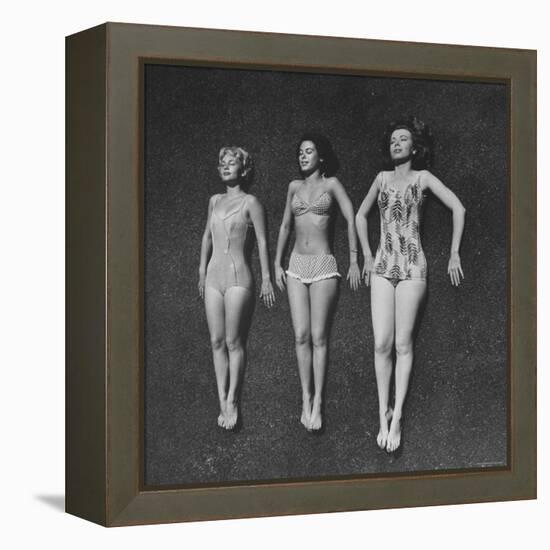 Three Sun Bathers Soaking Up Rays-Allan Grant-Framed Premier Image Canvas