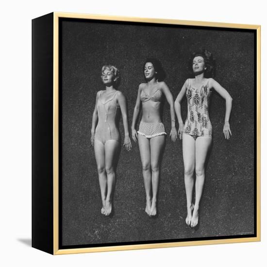 Three Sun Bathers Soaking Up Rays-Allan Grant-Framed Premier Image Canvas