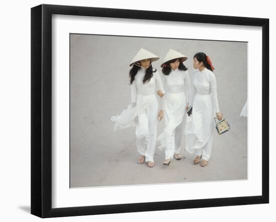 Three Vietnamese Young Women in White Fashion Walking Down the Street-Co Rentmeester-Framed Photographic Print